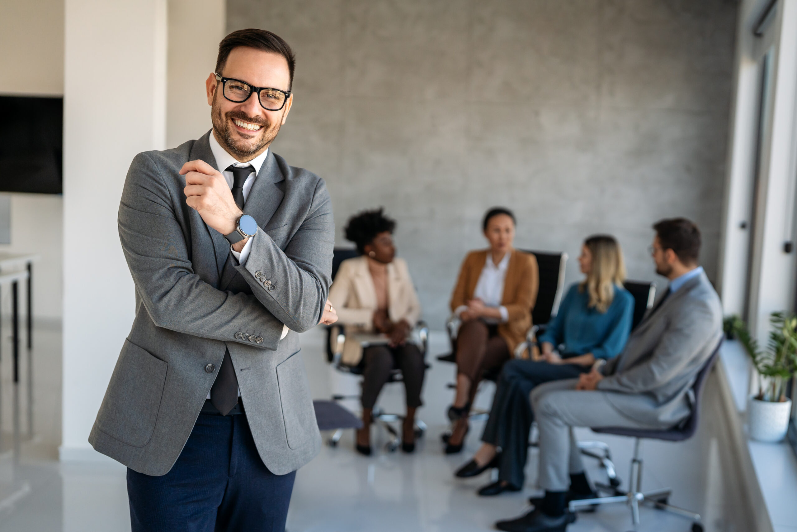 A leadership development trainer with employees